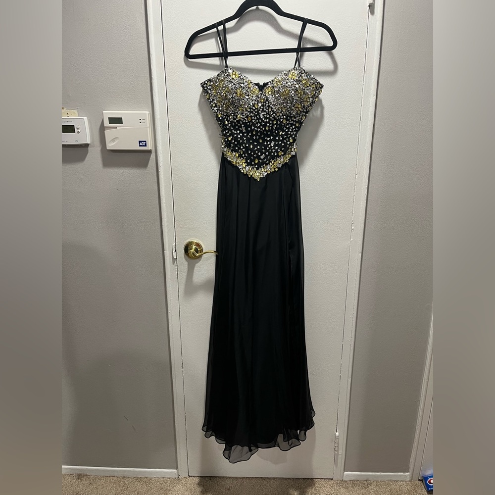 Black bejeweled strapless gown